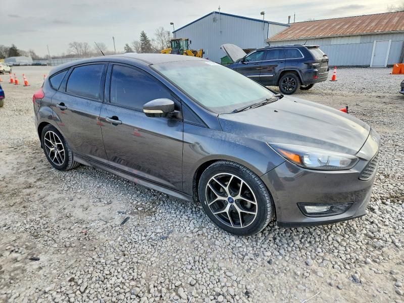 Photo 4 from auction – 2015 FORD FOCUS SE with VIN 1FADP3K20FL254169