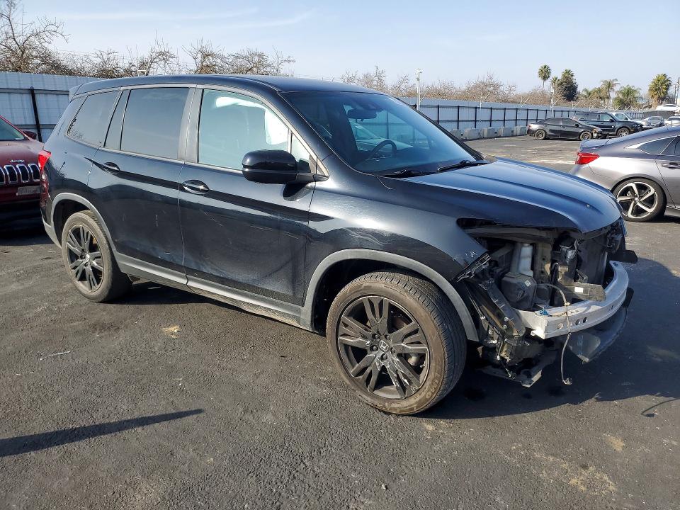 Photo 4 from auction – 2021 HONDA PASSPORT with VIN 5FNYF7H28MB002876