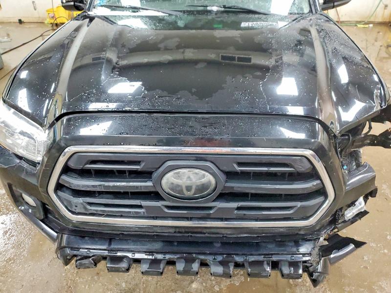 Photo 11 from auction – 2018 TOYOTA TACOMA DOU with VIN 3TMAZ5CN5JM054133