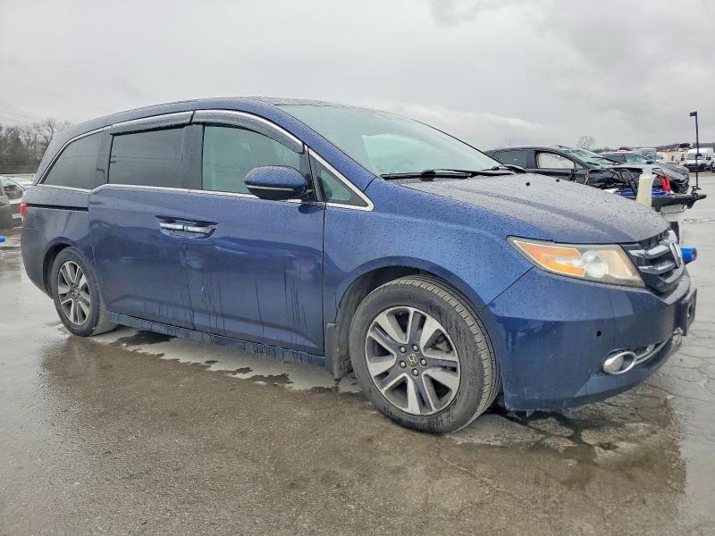 Photo 4 from auction – 2014 HONDA ODYSSEY TO with VIN 5FNRL5H97EB505086