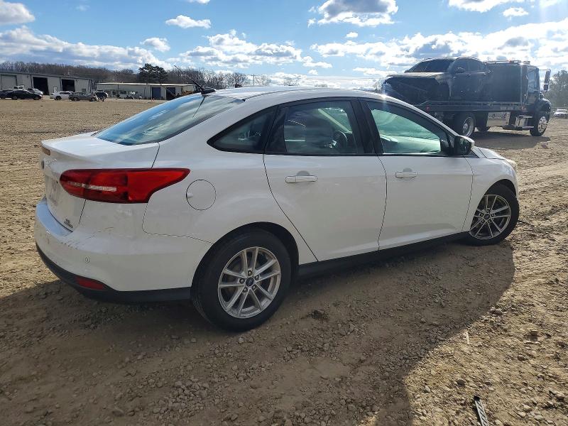 Photo 3 from auction – 2016 FORD FOCUS with VIN 1FADP3F27GL285267