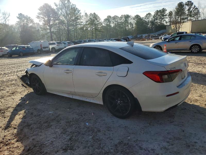 Photo 2 from auction – 2023 HONDA CIVIC SPOR with VIN 2HGFE2F51PH561857