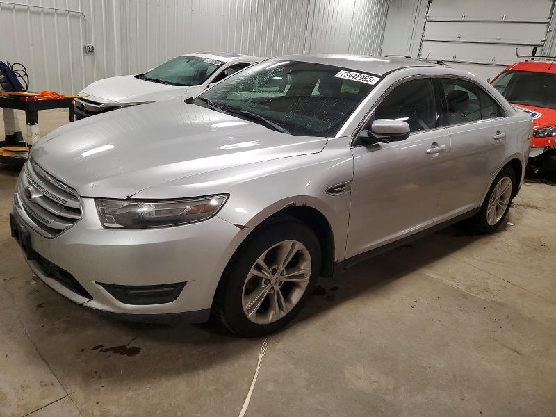 FORD TAURUS SEL 2014 with VIN 1FAHP2E8XEG152753 - Photo from auction