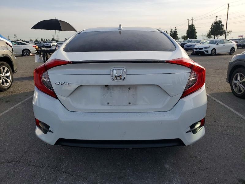Photo 6 from auction – 2018 HONDA CIVIC EX with VIN JHMFC1F44JX001371