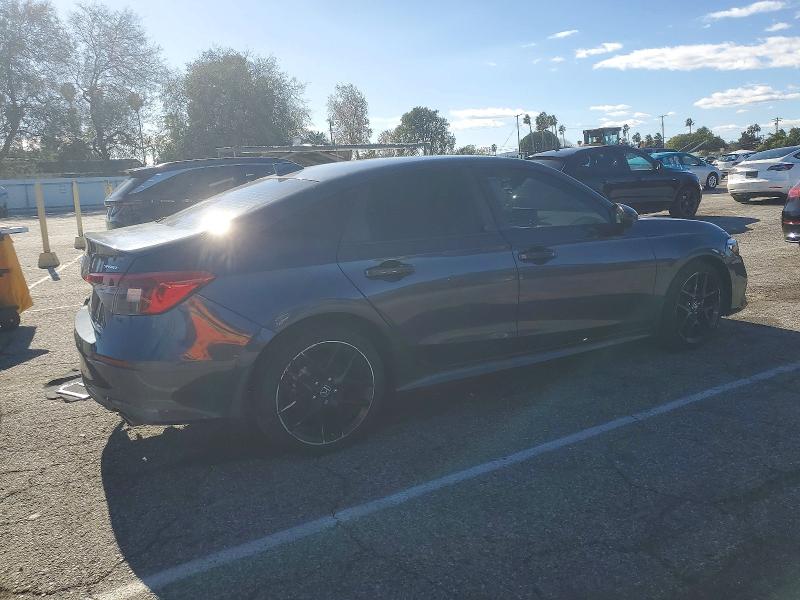 Photo 3 from auction – 2023 HONDA CIVIC SPOR with VIN 2HGFE2F56PH514176