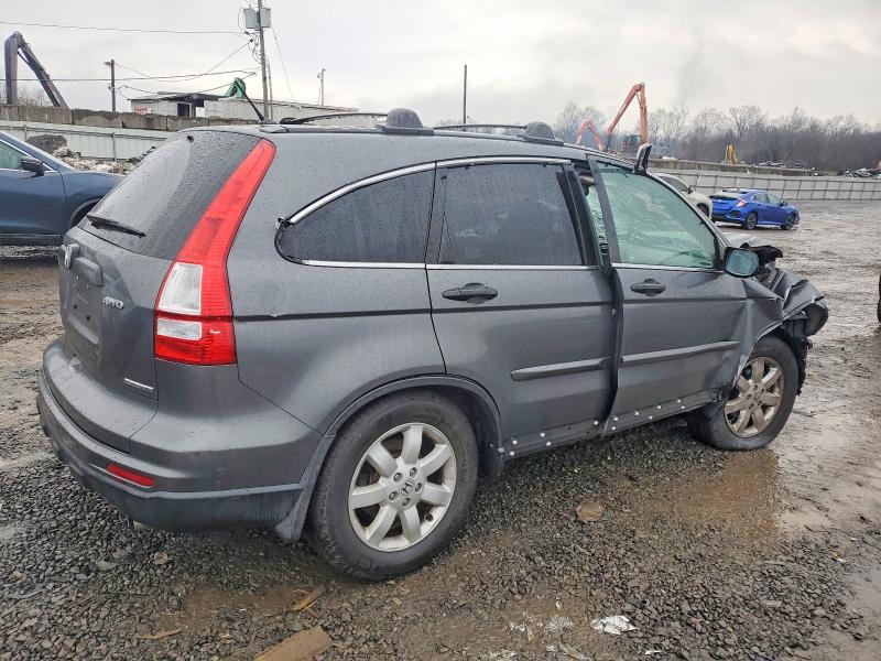 Photo 3 from auction – 2011 HONDA CR-V with VIN 5J6RE4H46BL060402