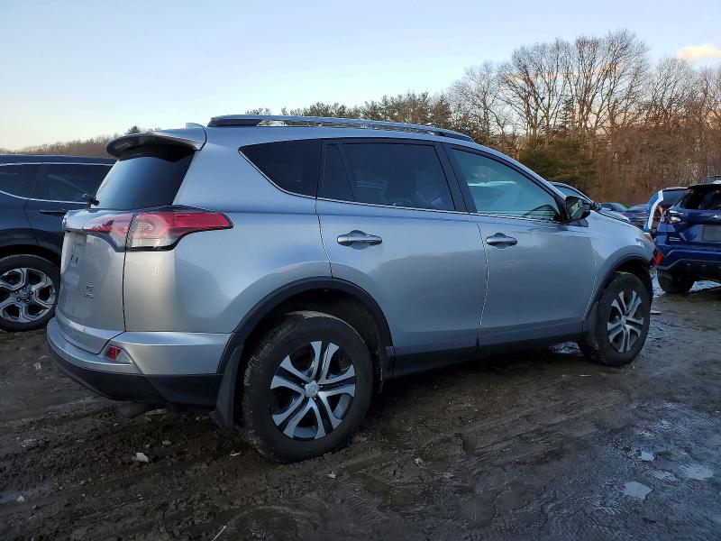 Photo 3 from auction – 2018 TOYOTA RAV4 LE with VIN JTMBFREV2JJ251629