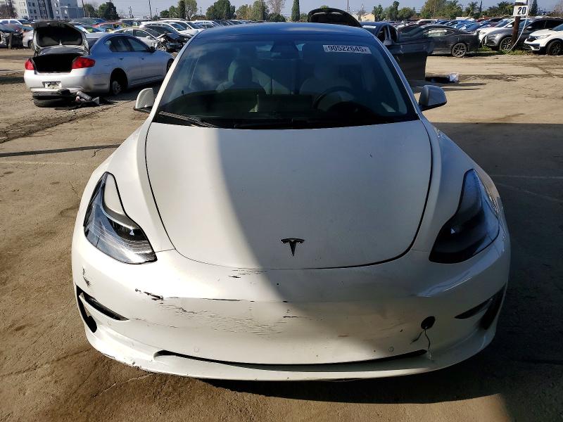 Photo 5 from auction – 2021 TESLA MODEL 3 with VIN 5YJ3E1EC8MF073986