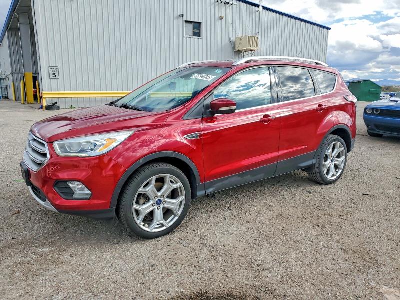 FORD ESCAPE TIT 2017 with VIN 1FMCU9JDXHUC06286 - Photo from auction