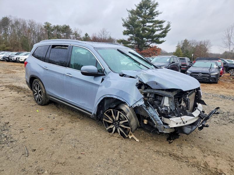 Photo 4 from auction – 2022 HONDA PILOT with VIN 5FNYF5H60NB014996