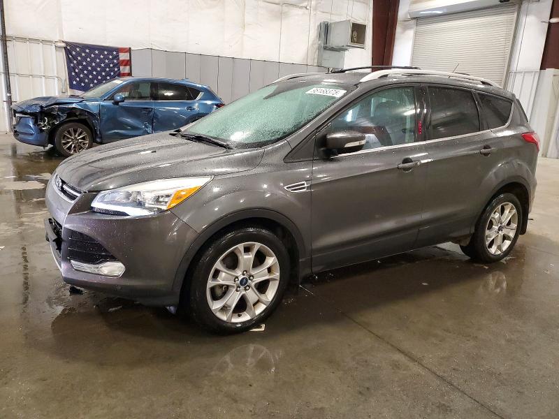 FORD ESCAPE TIT 2016 with VIN 1FMCU9JX4GUB42464 - Photo from auction
