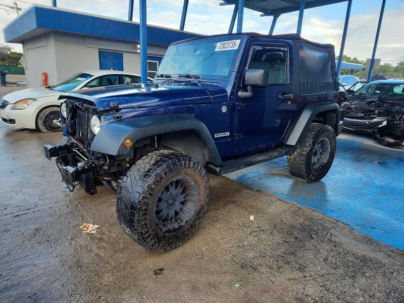 JEEP WRANGLER S 2013 with VIN 1C4AJWAG2DL605433 - Photo from auction