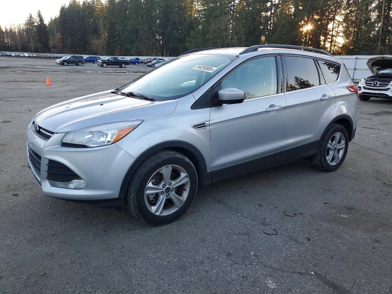 FORD ESCAPE SE 2016 with VIN 1FMCU9GX5GUC28745 - Photo from auction