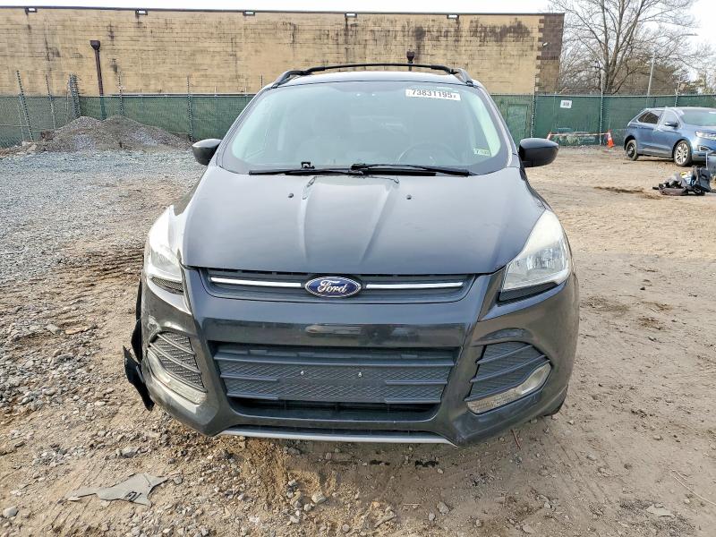 Photo 5 from auction – 2014 FORD ESCAPE with VIN 1FMCU9GX6EUD35414