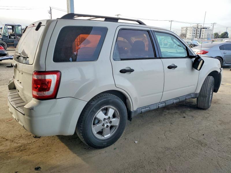 Photo 3 from auction – 2011 FORD ESCAPE with VIN 1FMCU0C77BKB35604