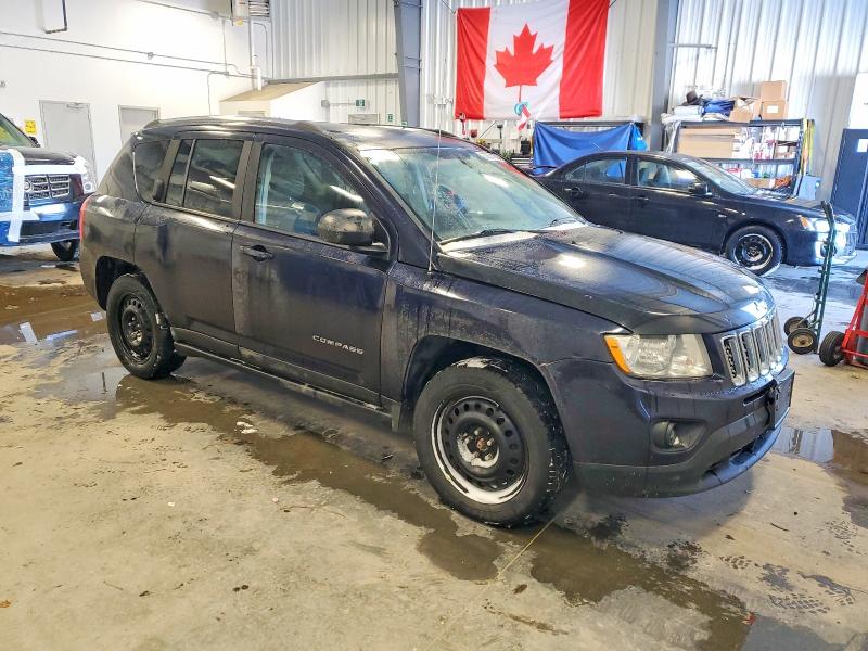 Photo 4 from auction – 2011 JEEP COMPASS with VIN 1J4NF4FBXBD136517
