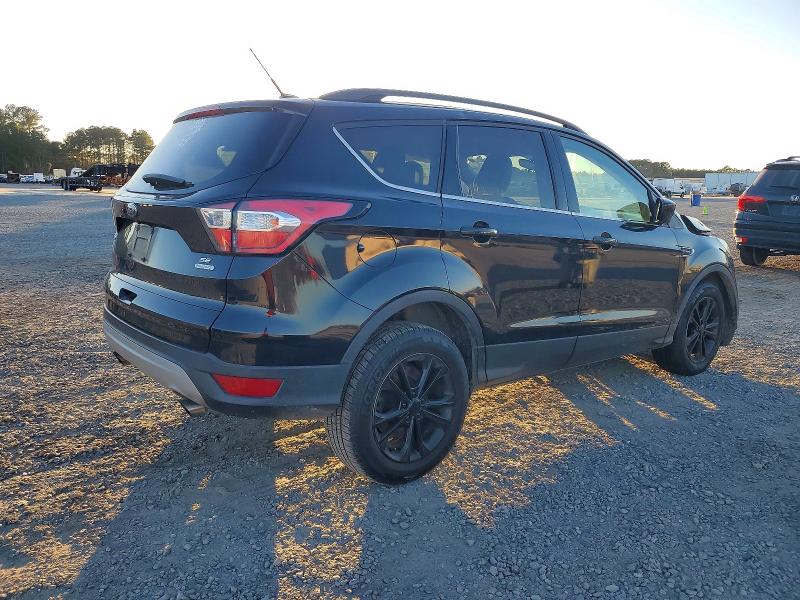 Photo 3 from auction – 2018 FORD ESCAPE SE with VIN 1FMCU0GD8JUC10751