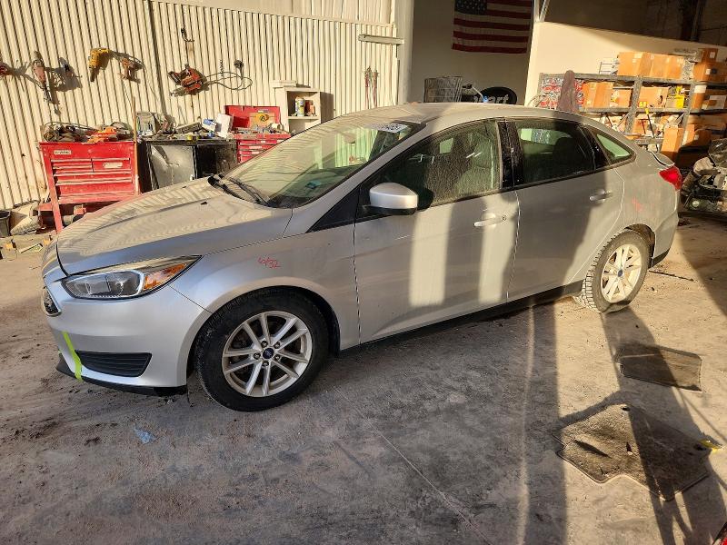 FORD FOCUS SE 2018 with VIN 1FADP3FEXJL277875 - Photo from auction