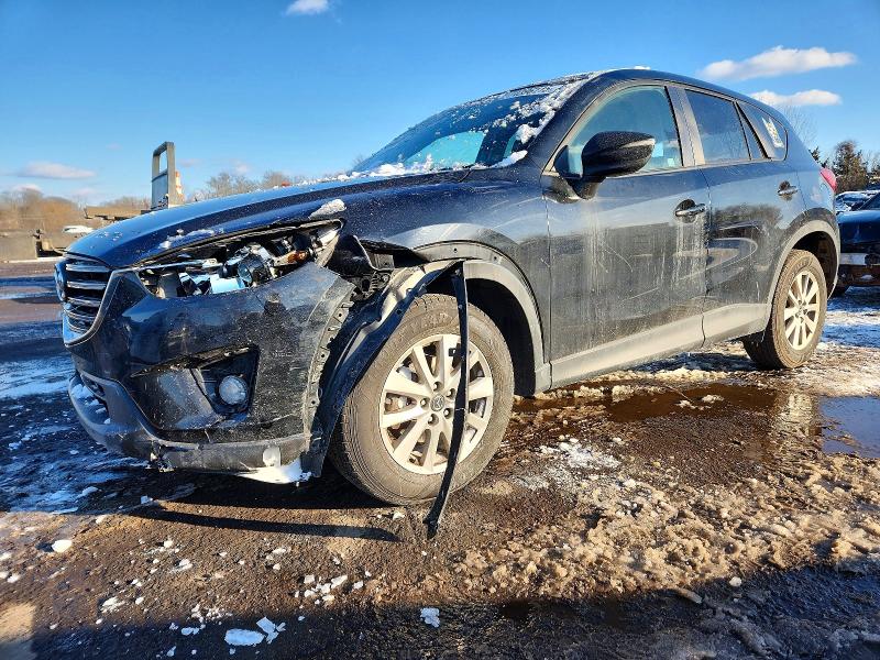 MAZDA CX-5 TOURI 2016 with VIN JM3KE4CY6G0868864 - Photo from auction