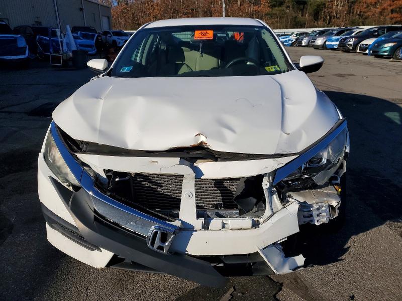 Photo 5 from auction – 2016 HONDA CIVIC LX with VIN 19XFC2F59GE230637
