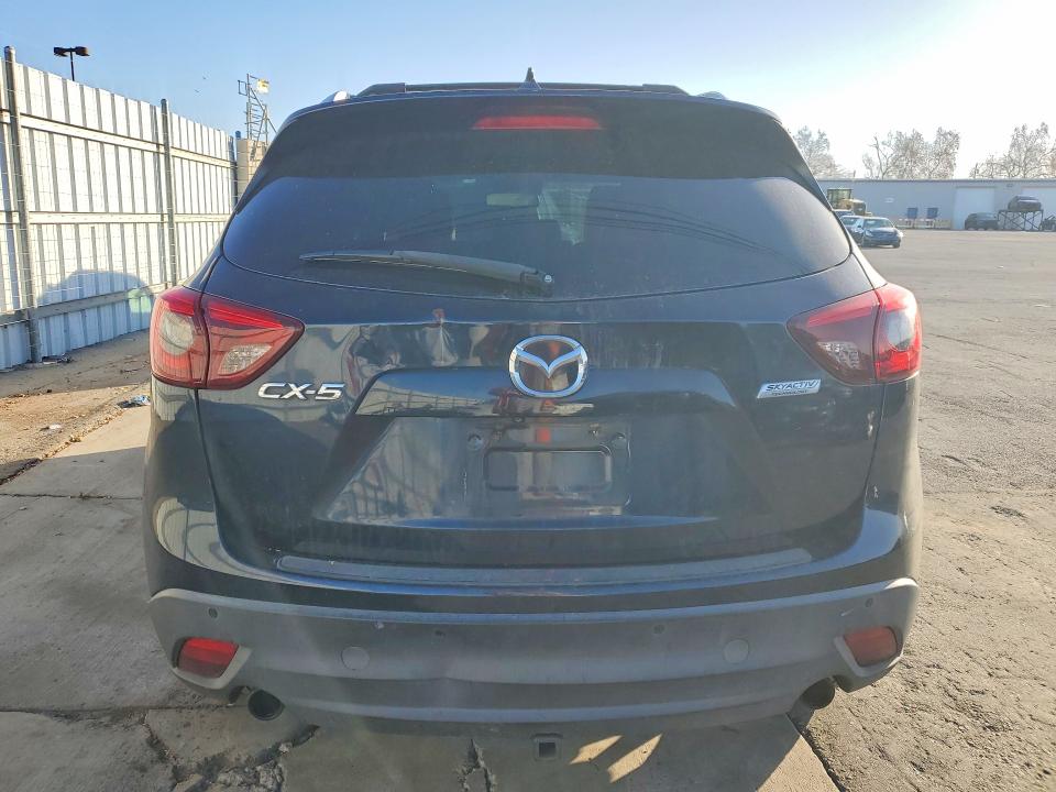 Photo 6 from auction – 2016 MAZDA CX-5 with VIN JM3KE2DY9G0678043