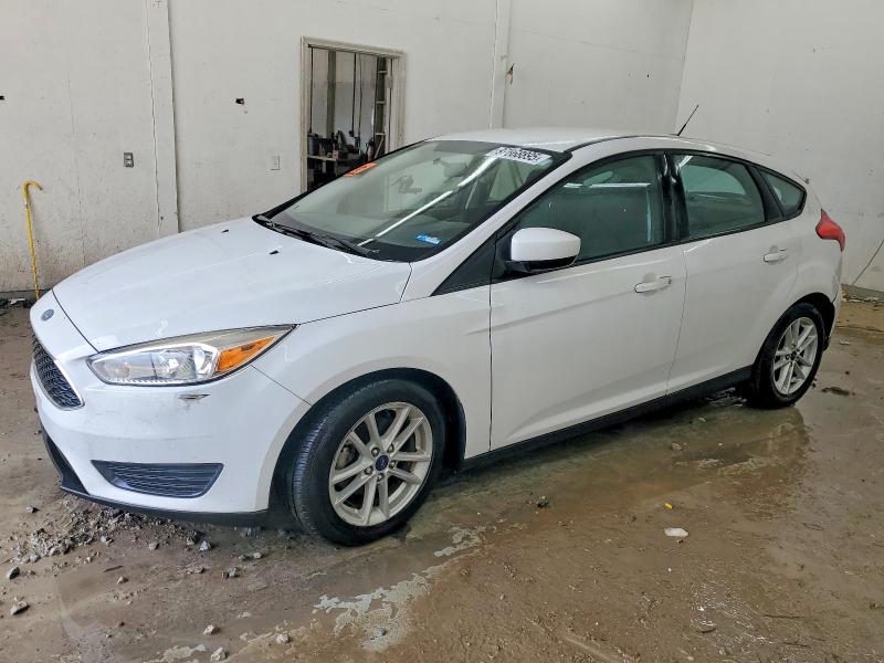 FORD FOCUS SE 2018 with VIN 1FADP3K24JL299088 - Photo from auction