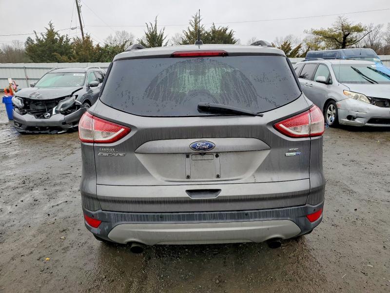 Photo 6 from auction – 2014 FORD ESCAPE with VIN 1FMCU9GXXEUD07034