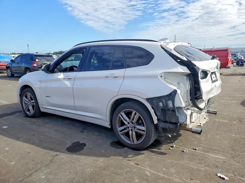 Photo 2 from auction – 2017 BMW X1 XDRIVE2 with VIN WBXHT3C35H5F85972