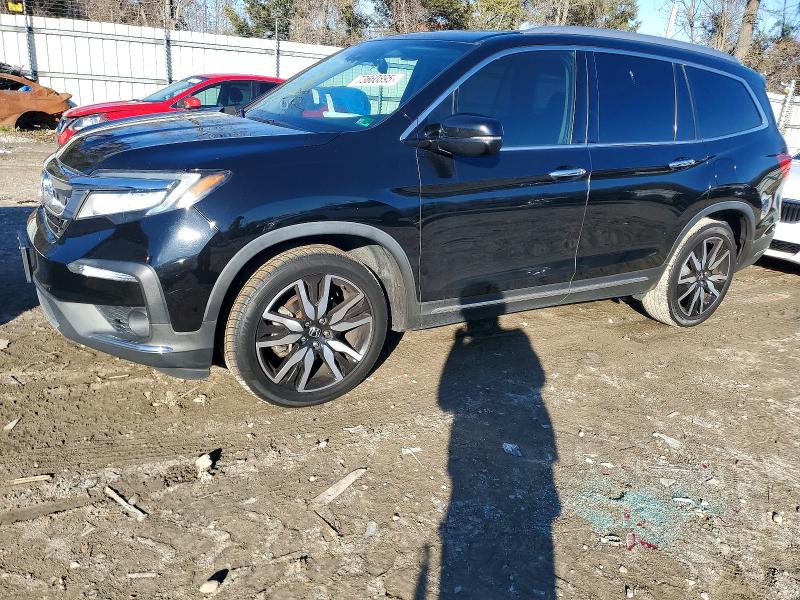 Photo 1 from auction – 2021 HONDA PILOT TOUR with VIN 5FNYF5H62MB021883