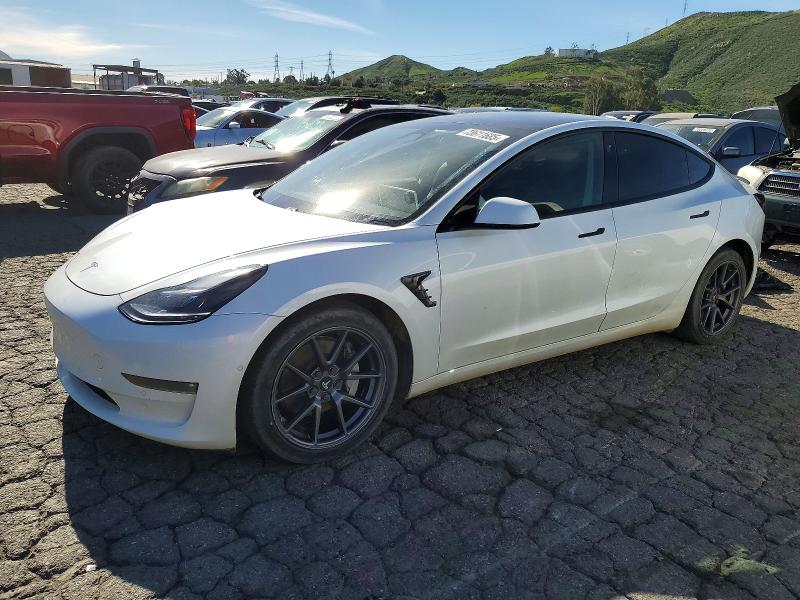 TESLA MODEL 3 2021 with VIN 5YJ3E1EB0MF879103 - Photo from auction