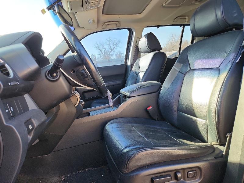 Photo 7 from auction – 2014 HONDA PILOT TOUR with VIN 5FNYF4H99EB017867