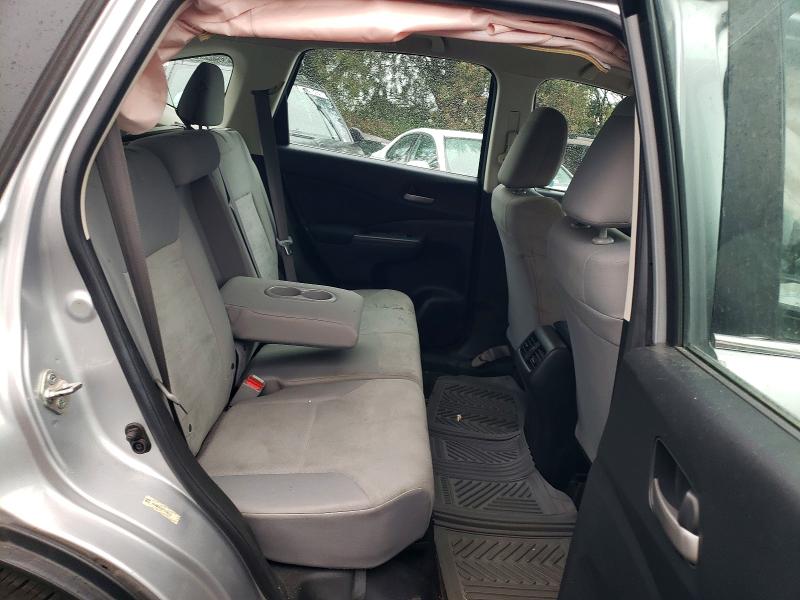 Photo 11 from auction – 2015 HONDA CR-V with VIN 3CZRM3H3XFG708234