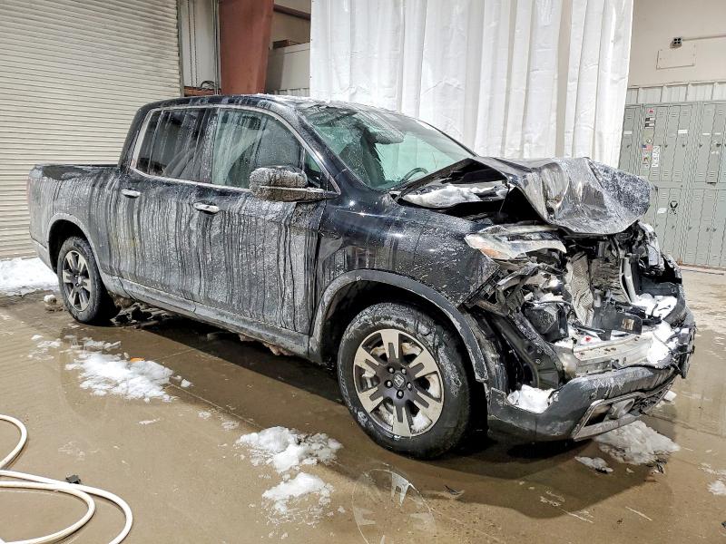 Photo 4 from auction – 2018 HONDA RIDGELINE with VIN 5FPYK3F77JB001871