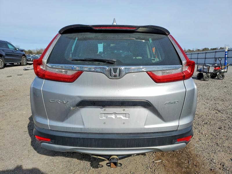 Photo 6 from auction – 2018 HONDA CR-V LX with VIN 2HKRW6H32JH225631