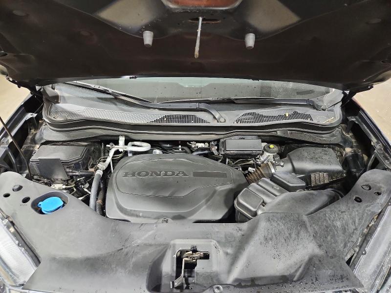 Photo 11 from auction – 2022 HONDA RIDGELINE with VIN 5FPYK3F53NB028148