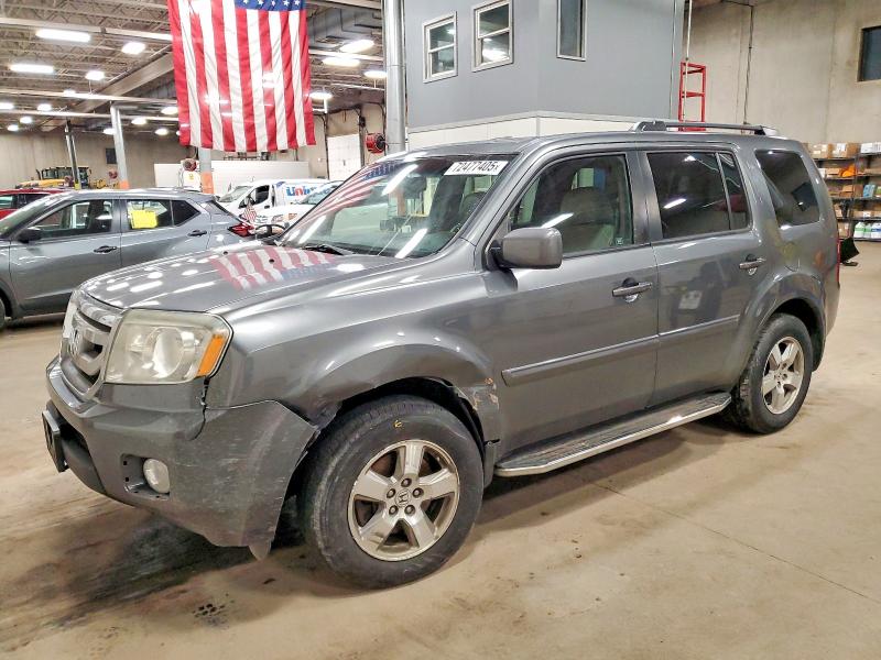 HONDA PILOT EXL 2011 with VIN 5FNYF4H69BB056380 - Photo from auction