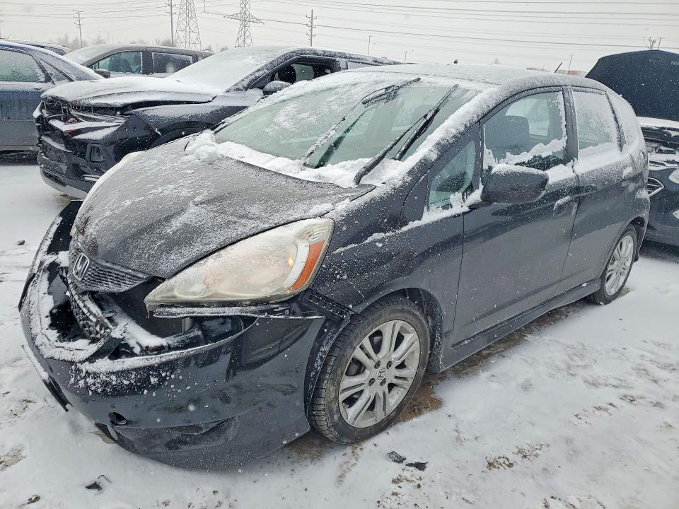 HONDA FIT 2009 with VIN JHMGE88419S012826 - Photo from auction