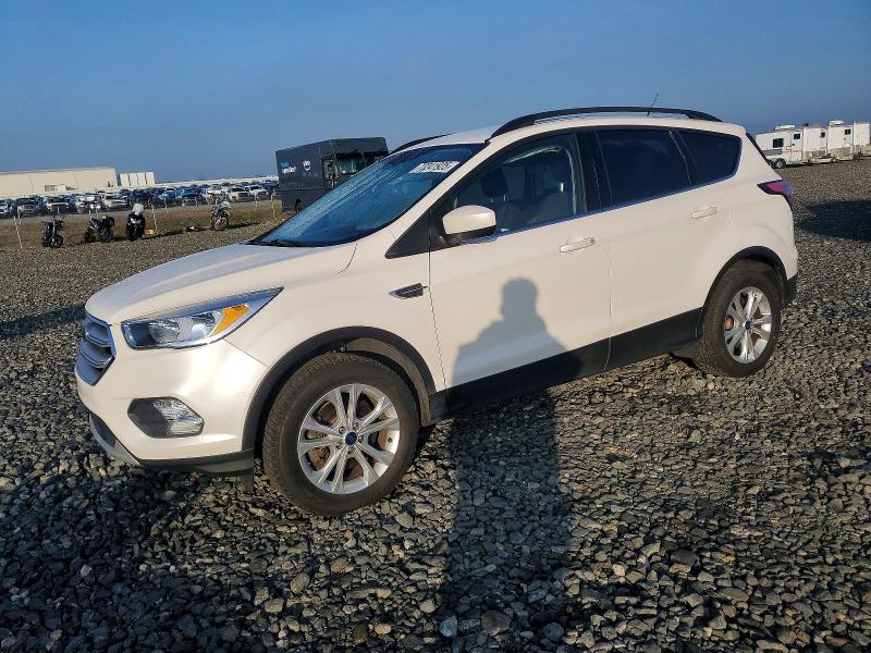 FORD ESCAPE 2018 with VIN 1FMCU9GD9JUD09678 - Photo from auction