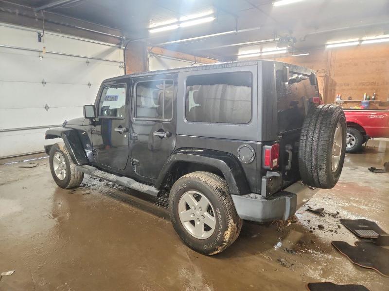 Photo 2 from auction – 2011 JEEP WRANGLER UNLIMITED with VIN 1J4BA7H15BL604635