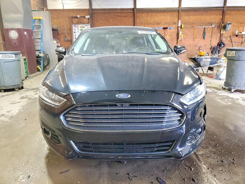 Photo 5 from auction – 2016 FORD FUSION TIT with VIN 3FA6P0K9XGR151669