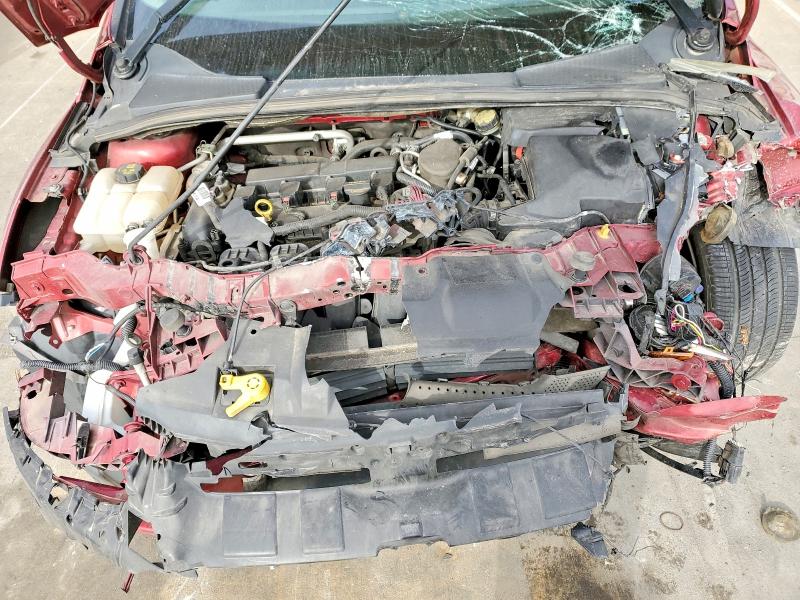 Photo 11 from auction – 2014 FORD FOCUS TITA with VIN 1FADP3J23EL298988
