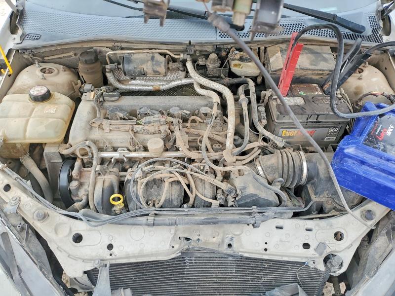 Photo 11 from auction – 2004 FORD FOCUS with VIN 3FAFP37Z54R122117