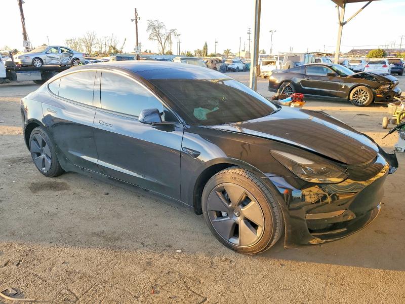 Photo 4 from auction – 2023 TESLA MODEL 3 with VIN 5YJ3E1EA3PF590535