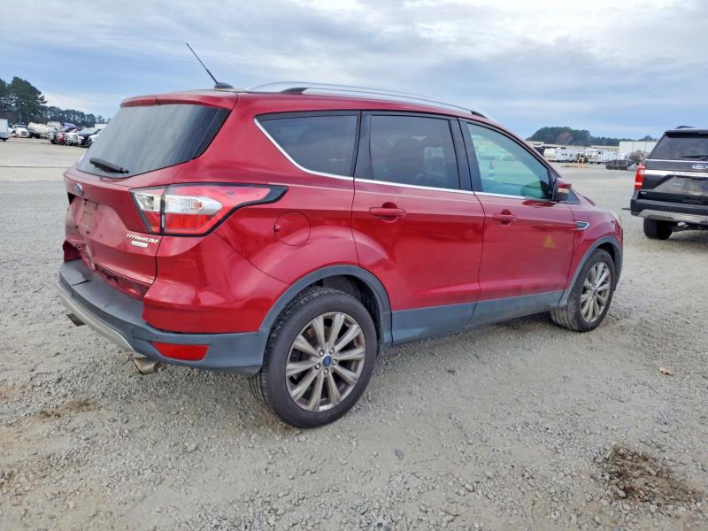 Photo 3 from auction – 2017 FORD ESCAPE with VIN 1FMCU0J95HUD05301