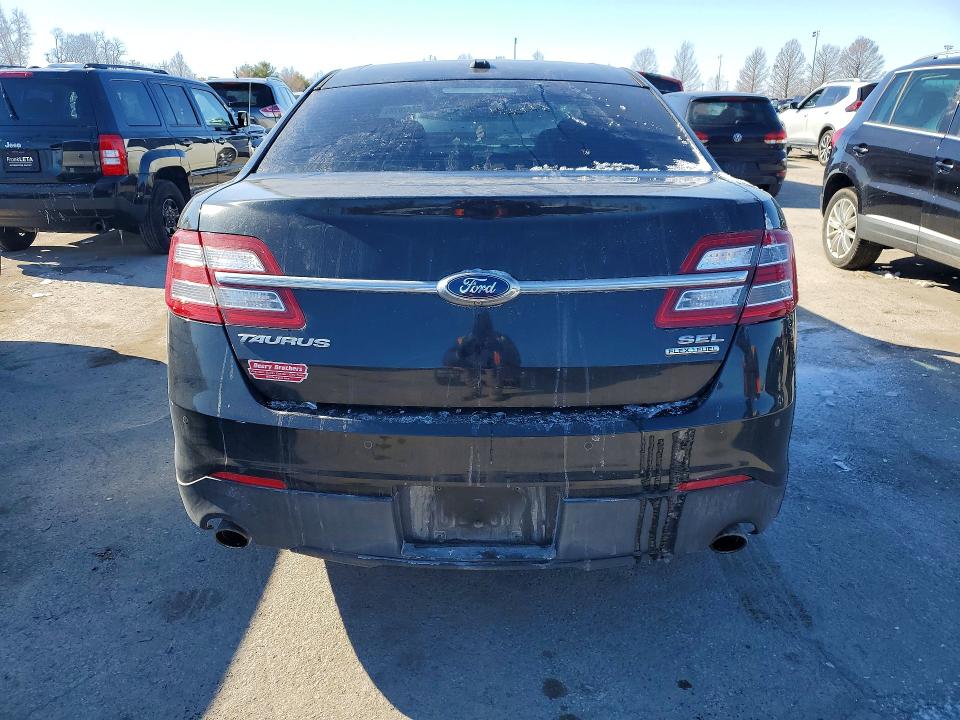 Photo 6 from auction – 2014 FORD TAURUS with VIN 1FAHP2E80EG114903