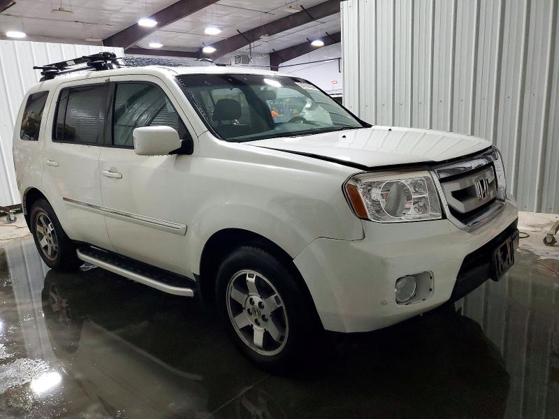 Photo 4 from auction – 2011 HONDA PILOT TOUR with VIN 5FNYF4H97BB017264