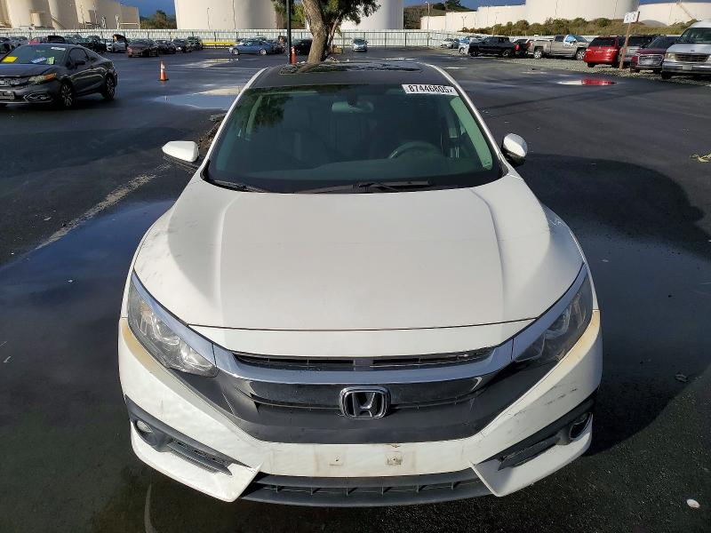 Photo 5 from auction – 2017 HONDA CIVIC with VIN 19XFC1F33HE205663