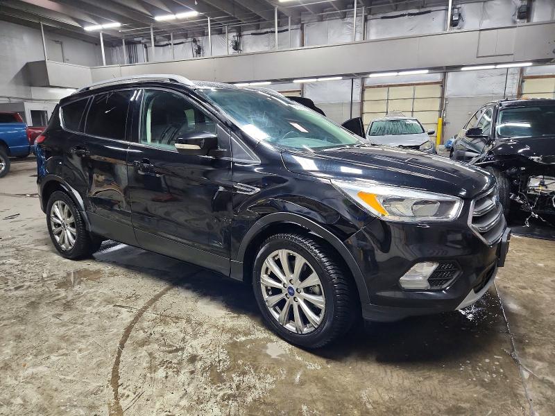 Photo 4 from auction – 2017 FORD ESCAPE TIT with VIN 1FMCU9J98HUE95650