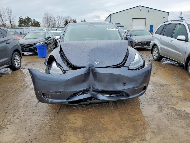 Photo 5 from auction – 2023 TESLA MODEL Y with VIN LRWYGDFD7PC938891