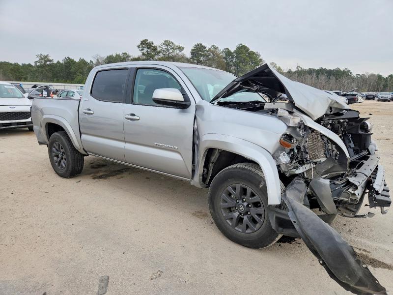 Photo 4 from auction – 2023 TOYOTA TACOMA with VIN 3TMAZ5CN1PM213626